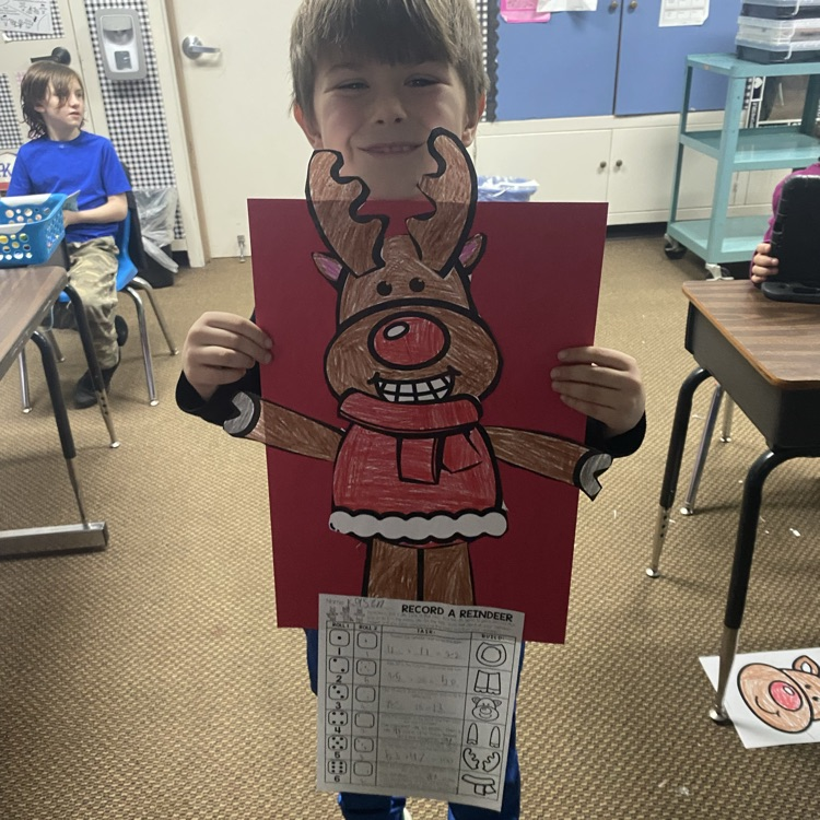 student showing off a math craftivity