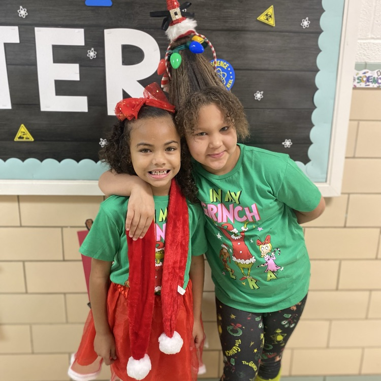 students in Grinch attire