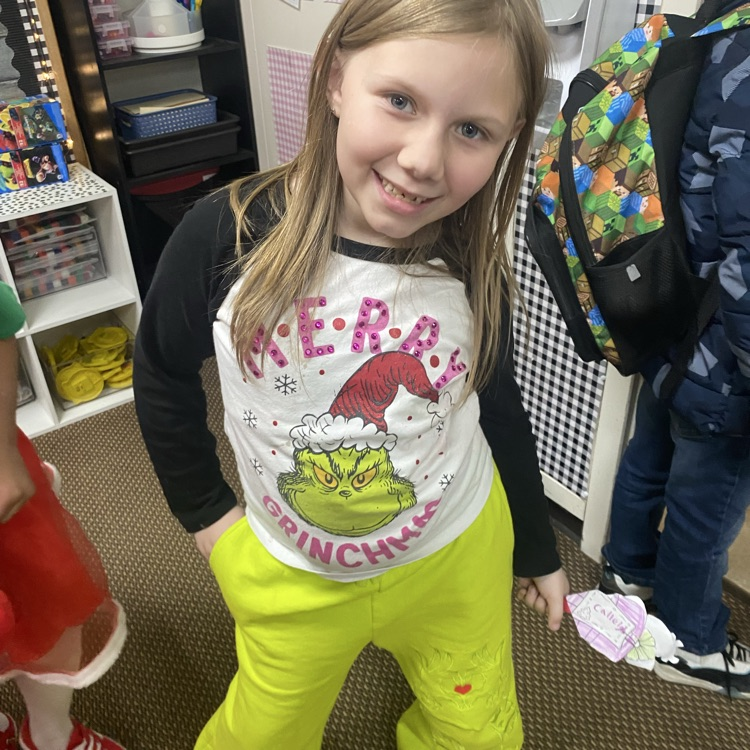 students in Grinch attire