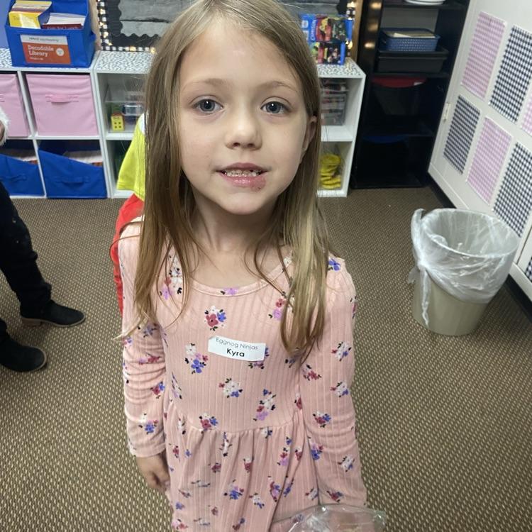 students in Grinch attire