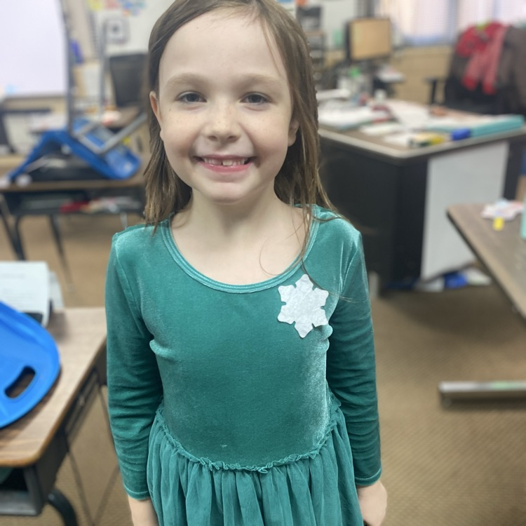 students in Grinch attire