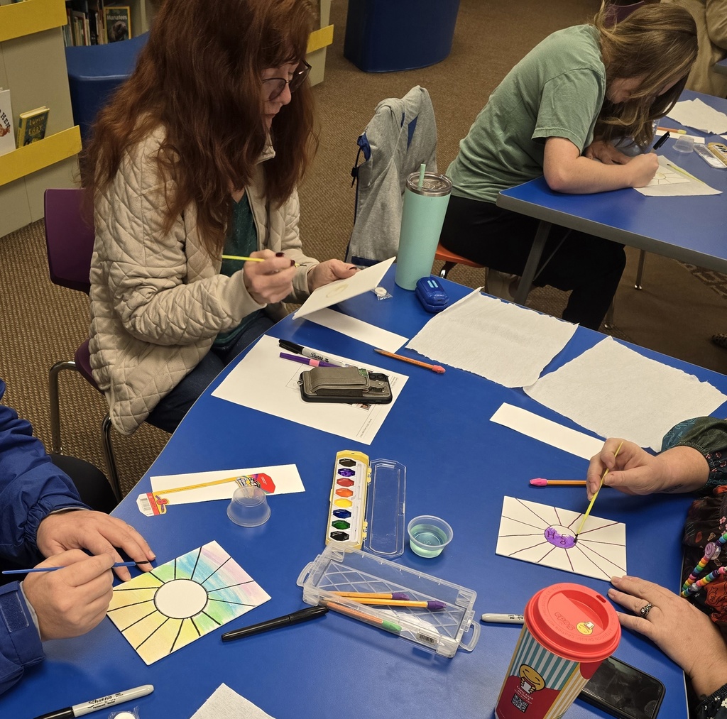 teachers painting pictures