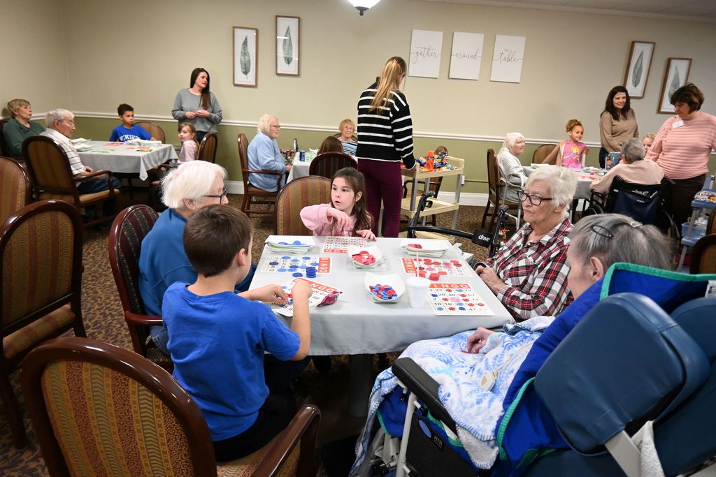 Students play BINGO with  Presby residents.