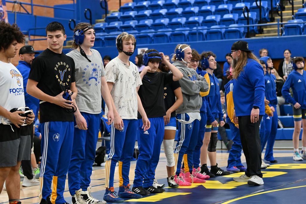 Young men from Parsons nd Erie wrestle.