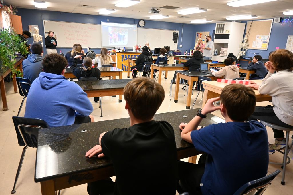 A student presents information on intro to health sciences class.