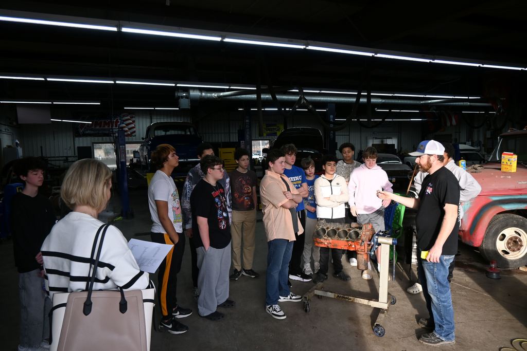 J.R. Keene talks to students about automotive classes.