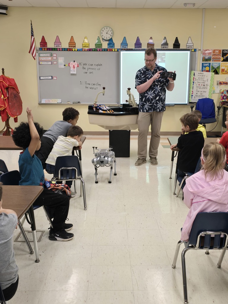 Mr. Peak shows the controller that allows Vector to move around.
