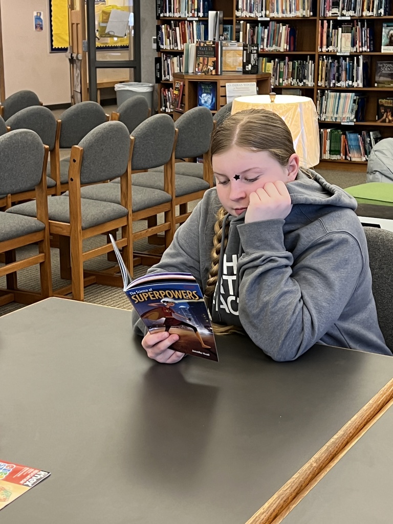 Reading a book on Superpowers.