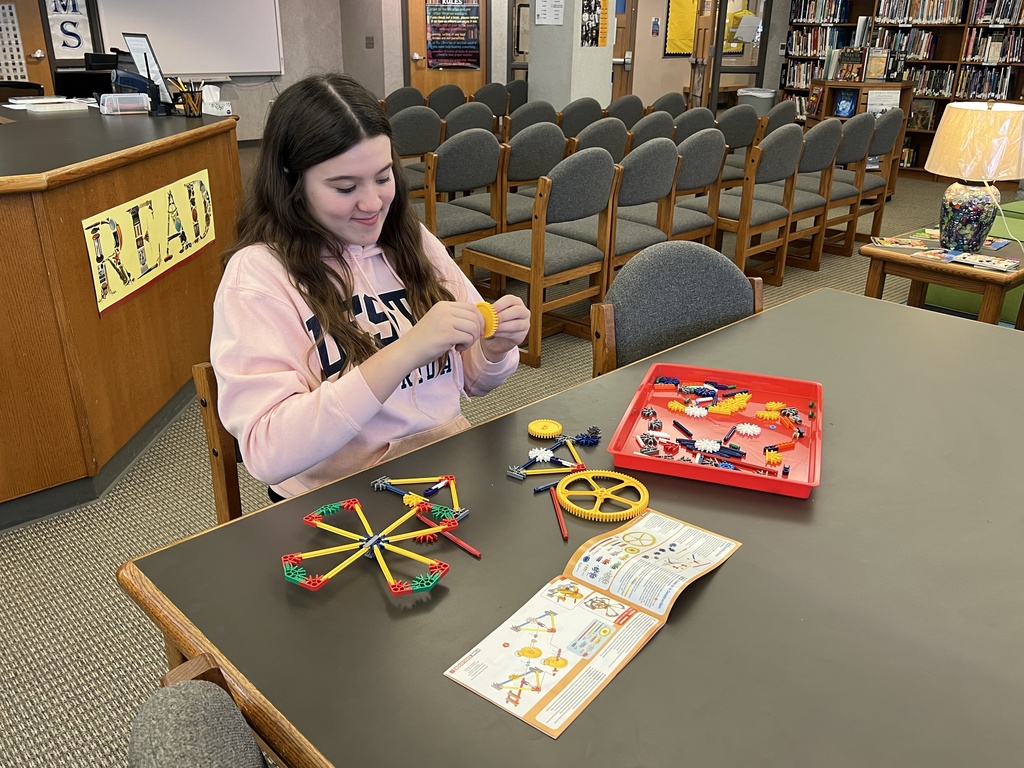 Building the  wheel from a STEM kit.