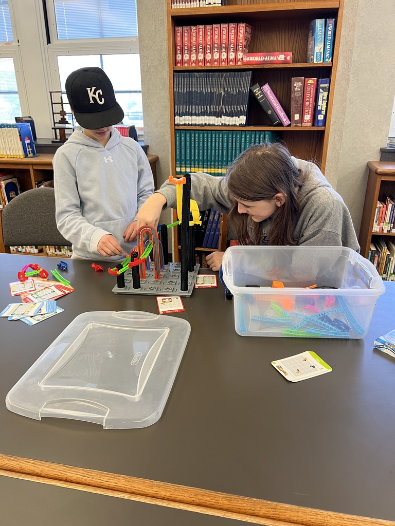 Boys working together on STEM item.