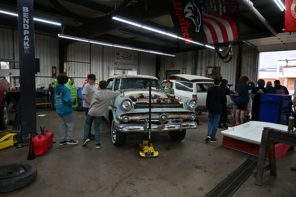 Students look around the Viking Speed Shop.