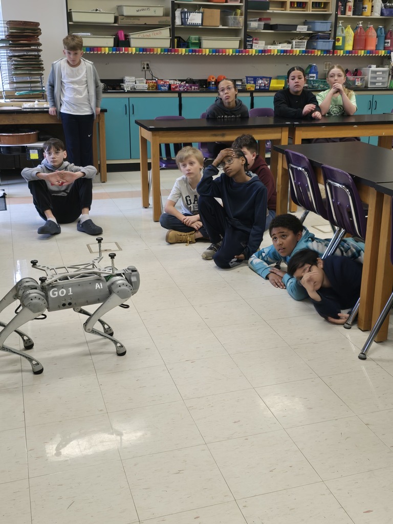 Fourth & Fifth grade students learn about coding and robotics from Vector the Viking.