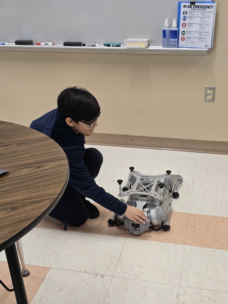 Fourth & Fifth grade students learn about coding and robotics from Vector the Viking.