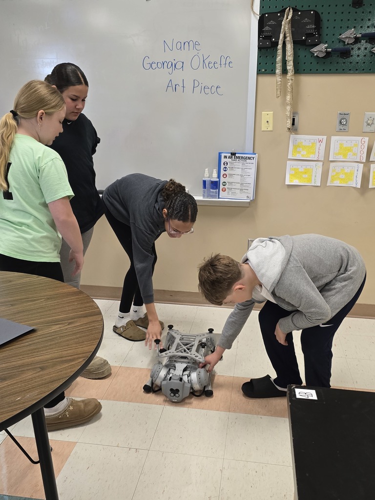 Fourth & Fifth grade students learn about coding and robotics from Vector the Viking.