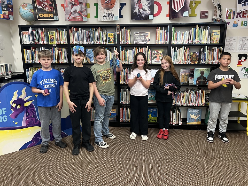 Fifth grade Book Fair Winners of dragon items  (3D dragon, dragon with egg, and dragon egg fidget)