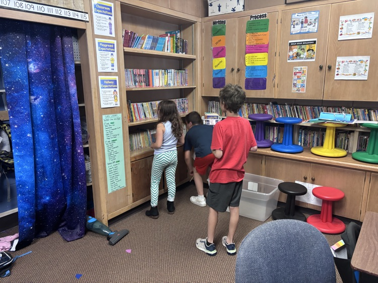 measuring the length of our library shelf