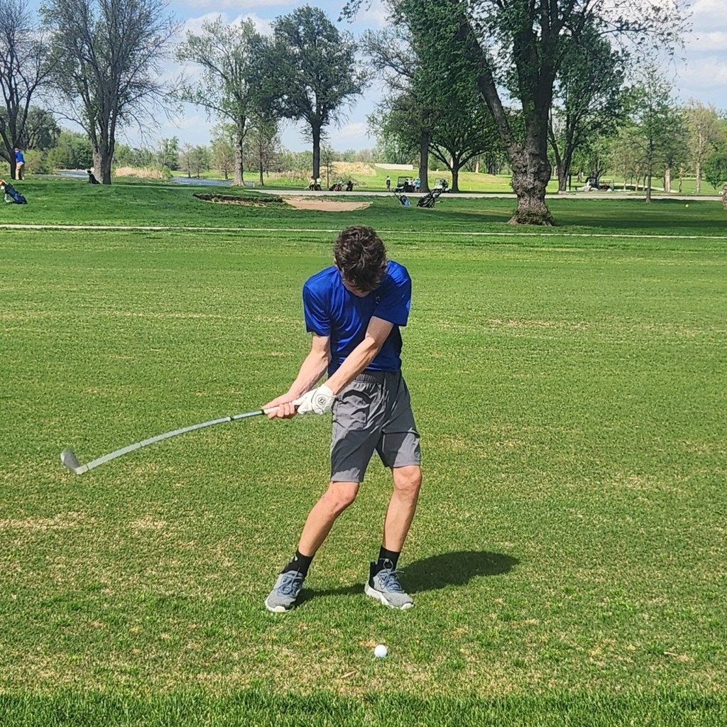 Kaison McRay hits his second shot on number 1.