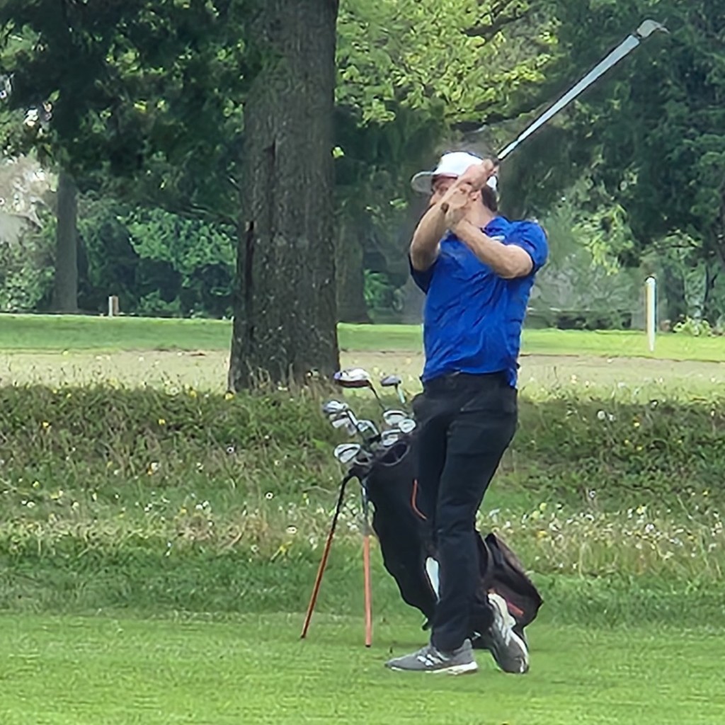 Grayson Bolt hits his approach shot on number 7.