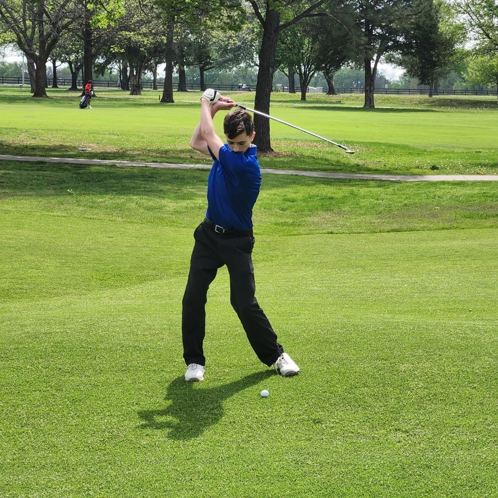 Brok McDaniel mid backswing on number 6.
