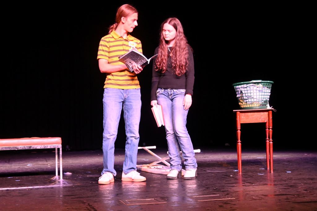 A man shares with a woman what's in a journal he keeps.