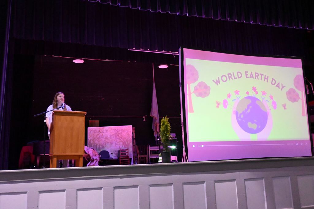 One of the students starts off the assembly for World Earth Day.
