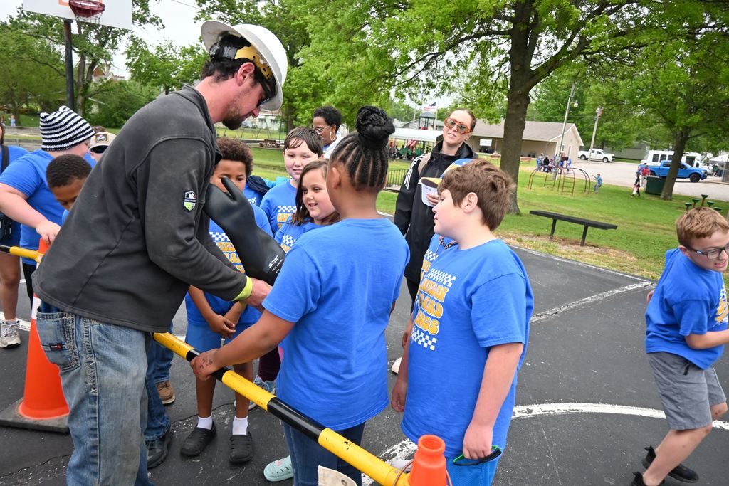 Students learn about safety gear for electricians.
