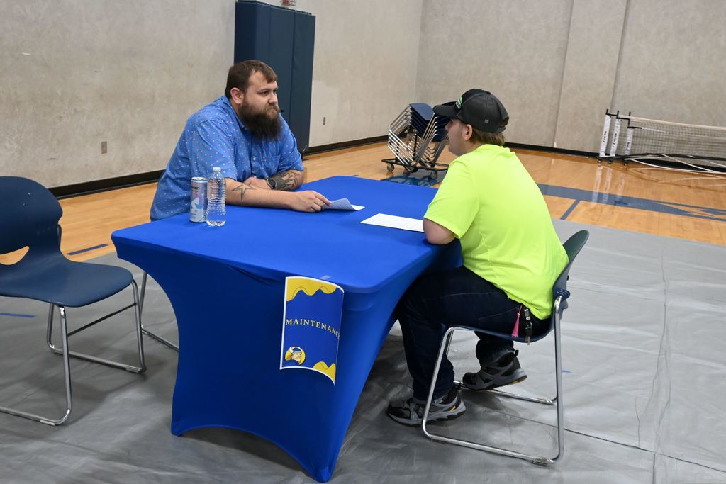 A student interviews for a job.