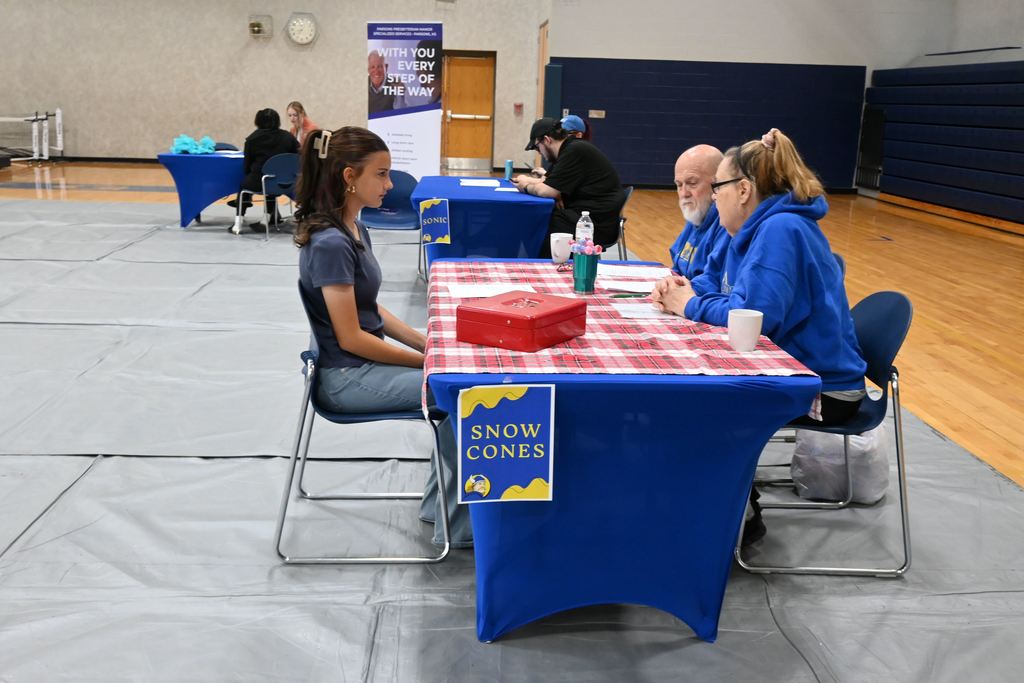 A student interviews for a job.