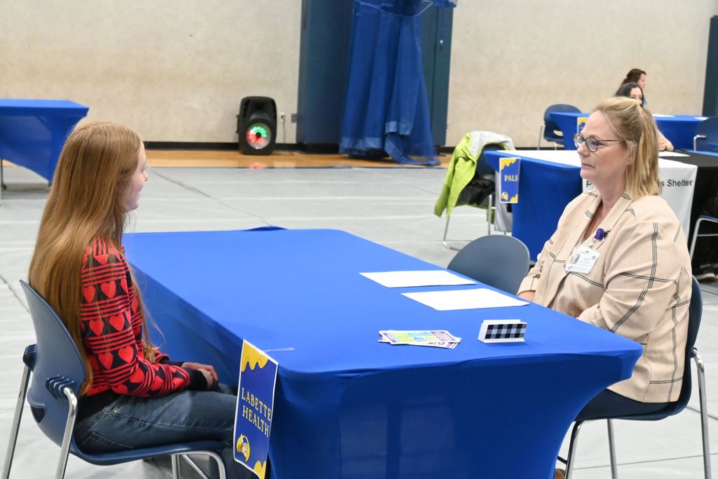 A student interviews for a job.