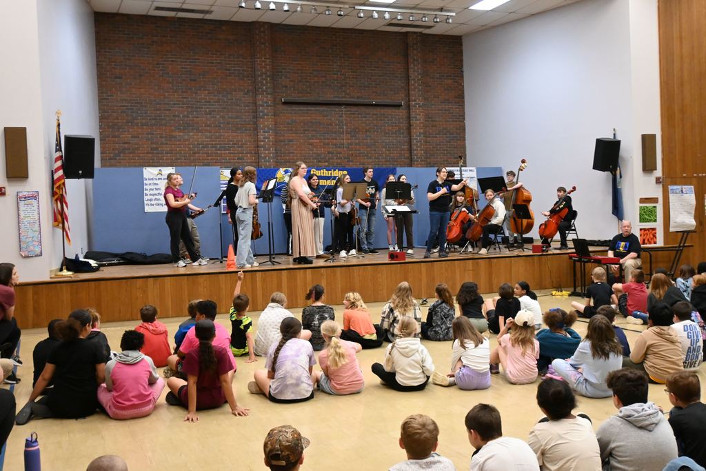 Mrs. Oberle answers students' questions.