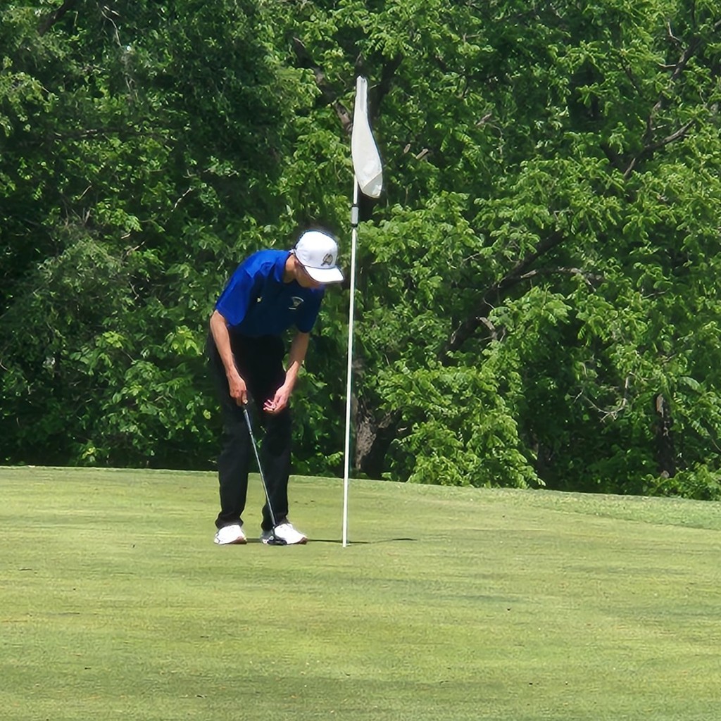 Brody watching his par putt sink in on number 6