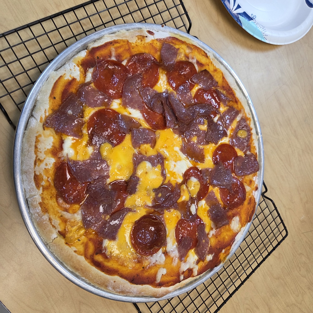 Girls make meat lover pizza