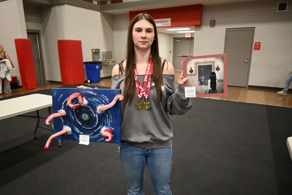 Gabby Goss brought home two medals .