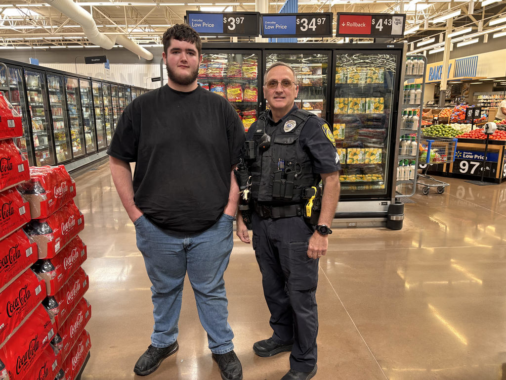 Jericho Mattoon and Officer Mark Raney in Walmart.