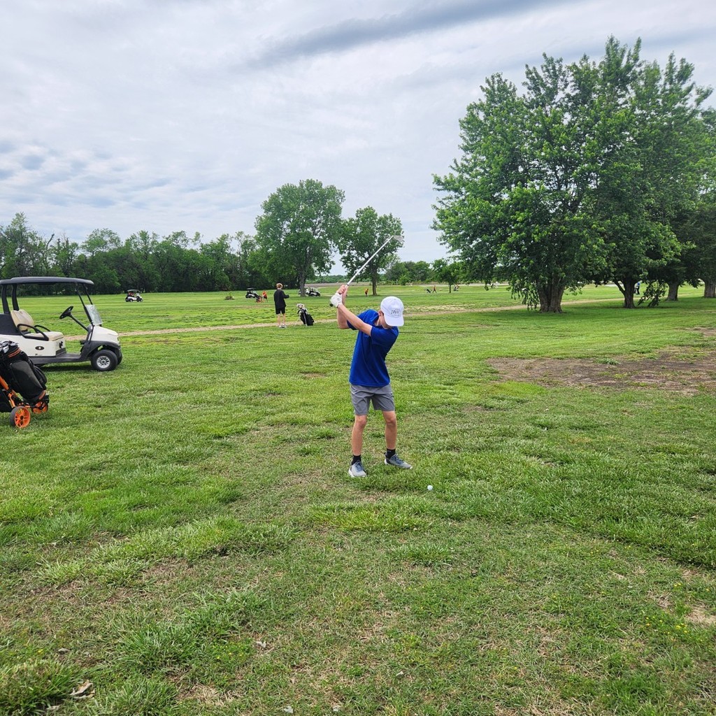 Kaison McRay hits his approach shot on number 1.