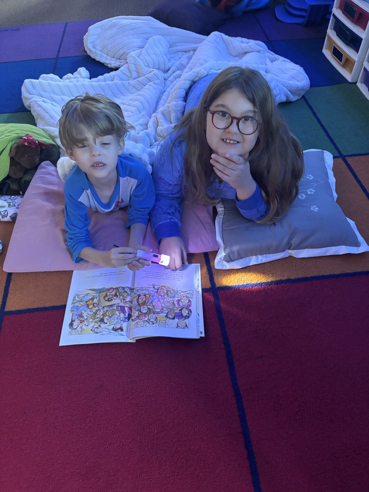 We are reading up a storm for our read-a-thon day. Nothing like curling up with a good book and friend. 