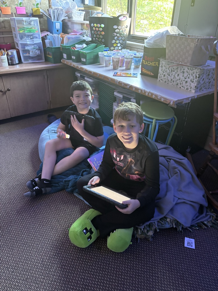 We are reading up a storm for our read-a-thon day. Nothing like curling up with a good book and friend. 