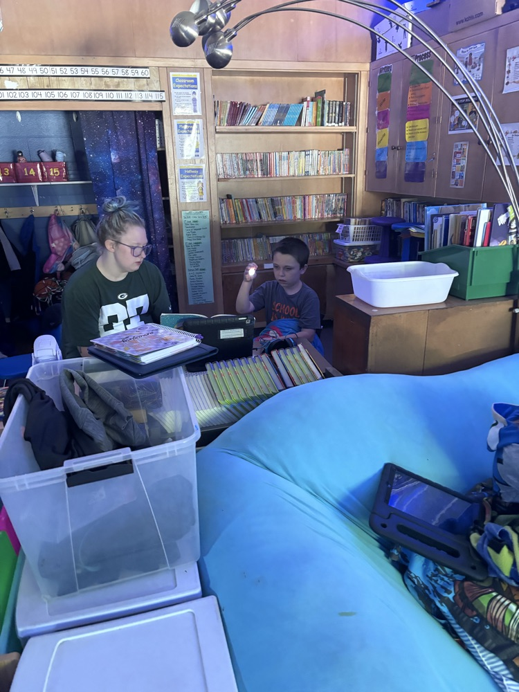 We are reading up a storm for our read-a-thon day. Nothing like curling up with a good book and friend. 
