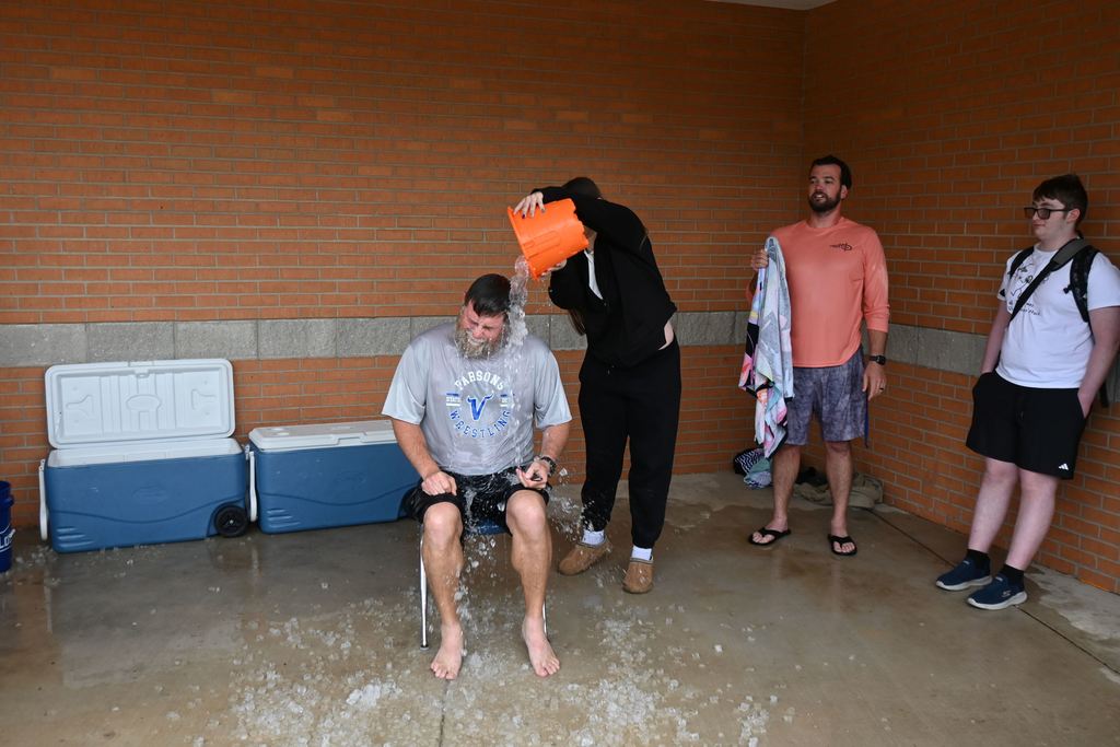Ball gets a pail of ice water dumped on him.