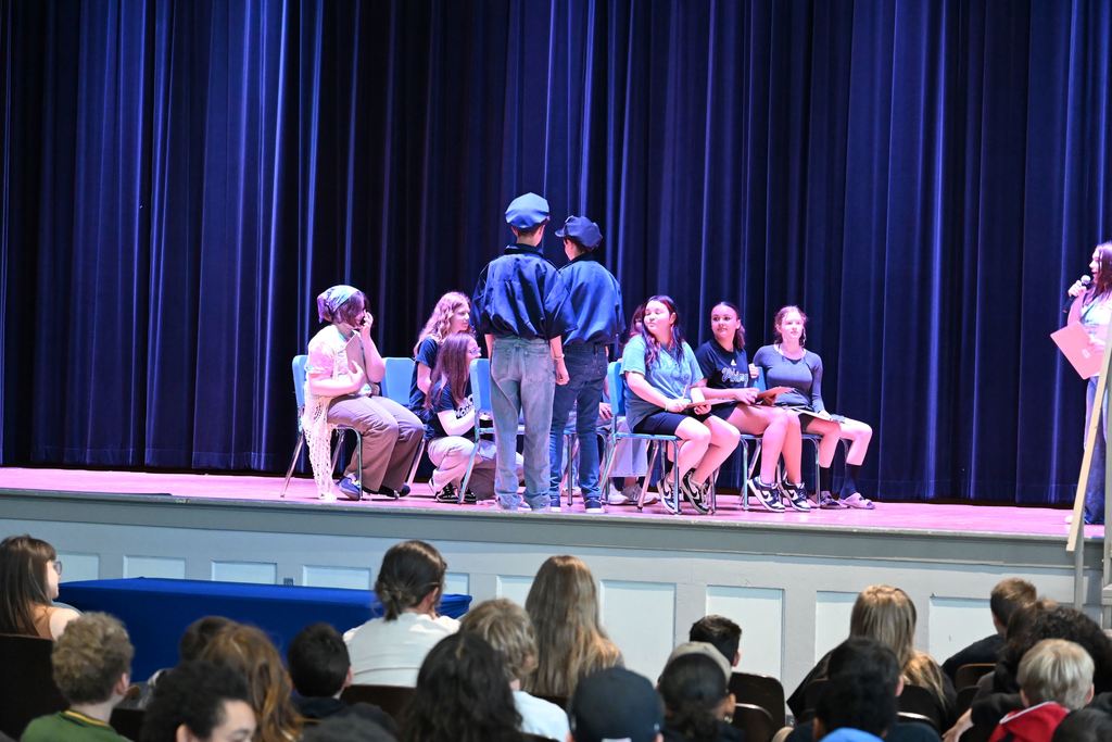 In this scene police come to remove a cheater from class.