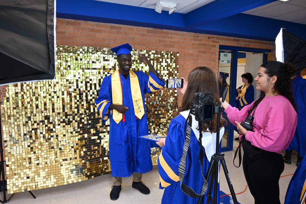A senior nakes a quick video with friends.