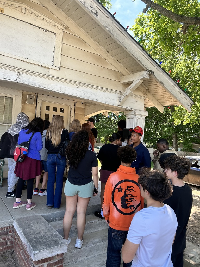 Students touring The Outsiders House Museum