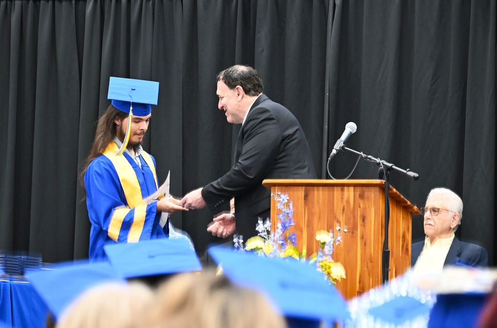 Kyas Smith receives the award for perfect attendance.
