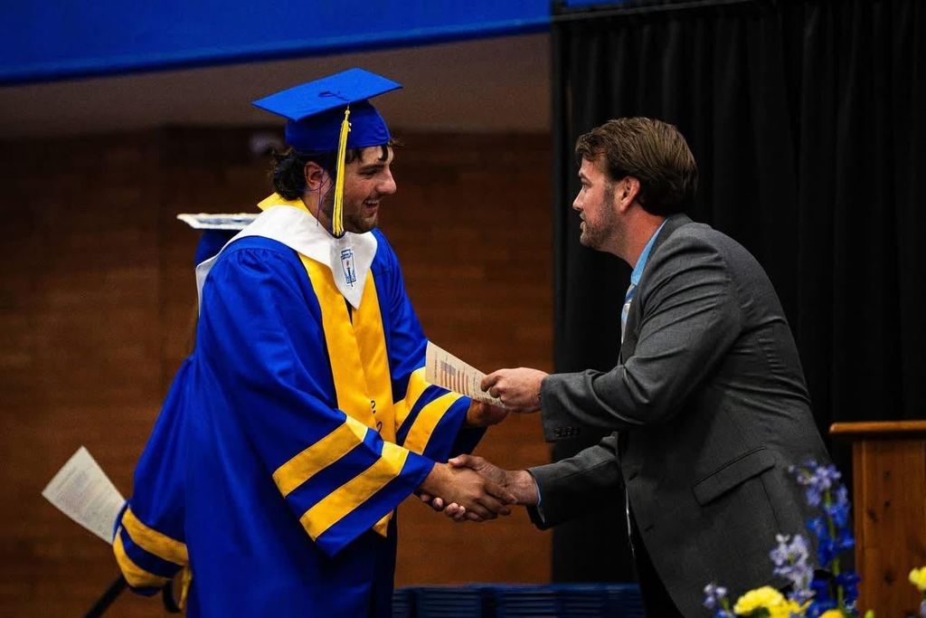 Cole Kennett receives his award.