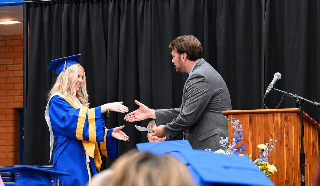 Sadie Ray receives her award.