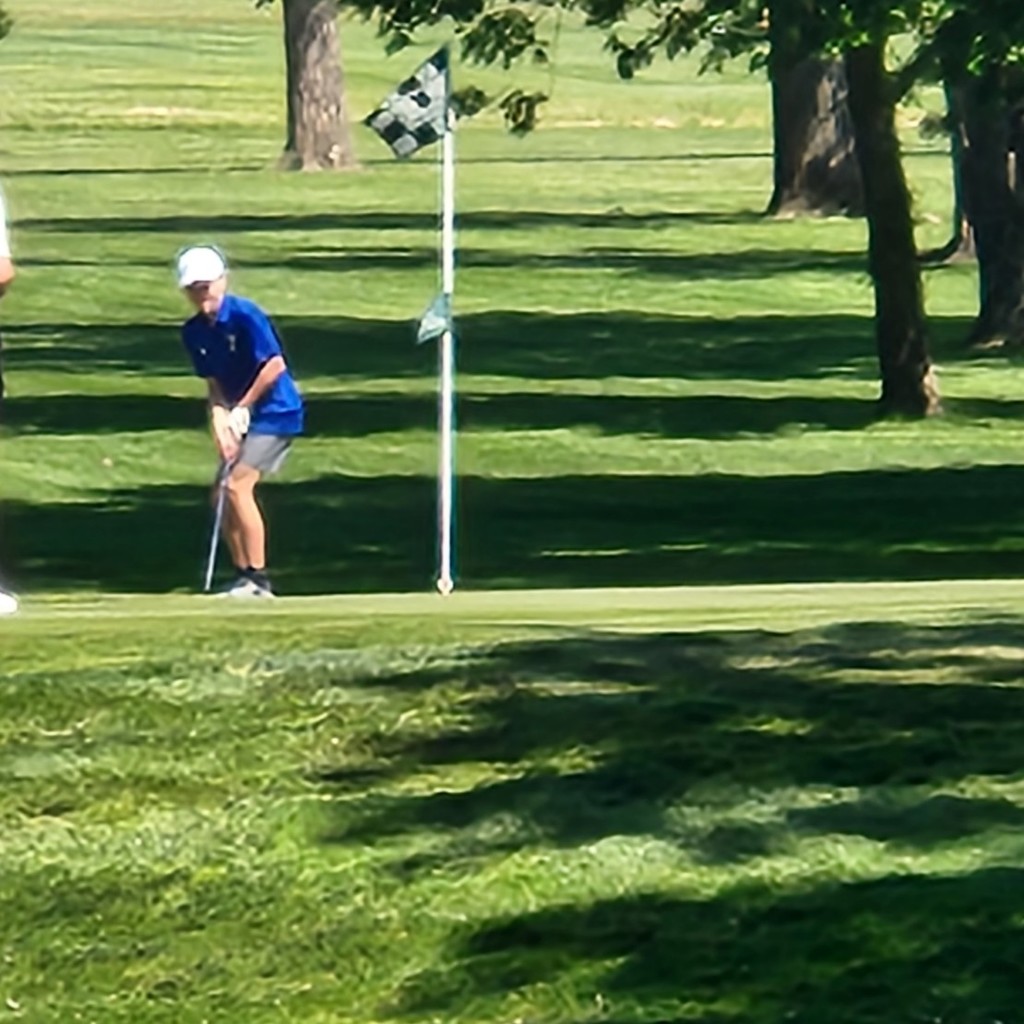 Kaison McRay sinks his putt on number 3 for par.