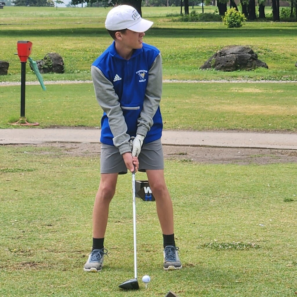 Kaison McRay teeing off on 10.