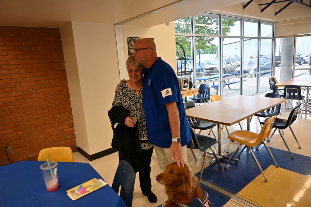 Swanson gets a hug from Proehl.