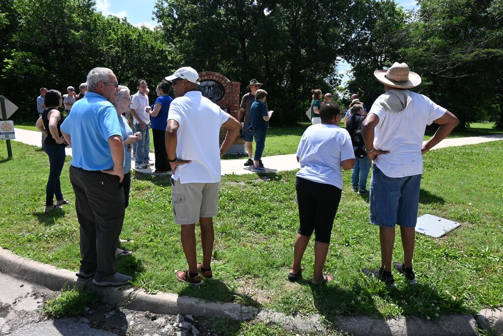 Residents of the city of Parsons gather for the ribbon cutting.