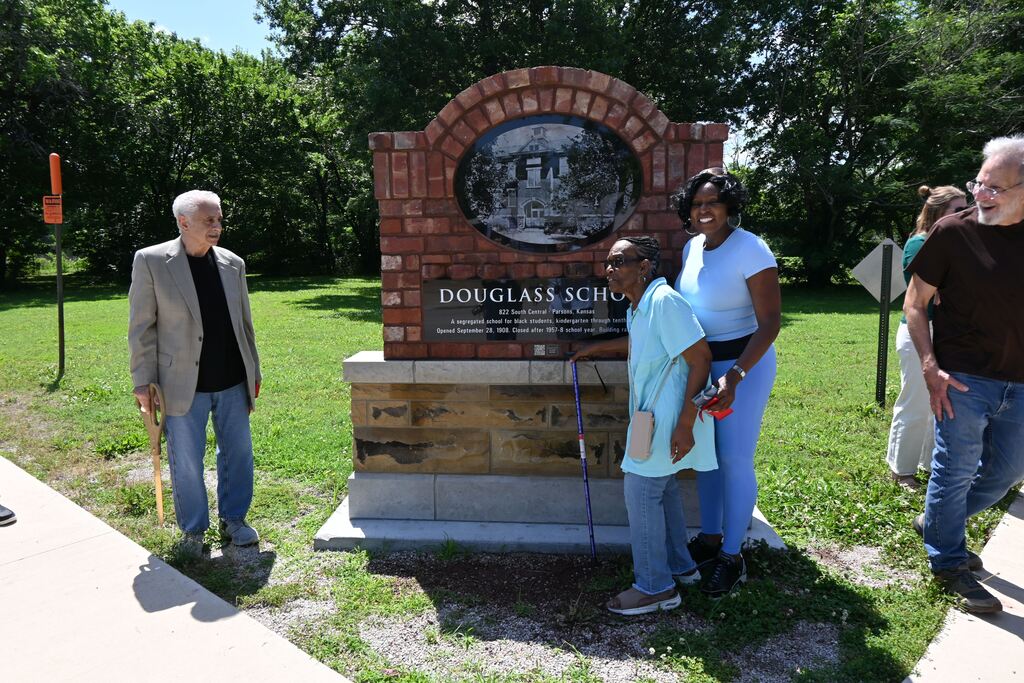 Delphia Davis who attended Douglass,  and her daughter, stopped to visit the memorial.